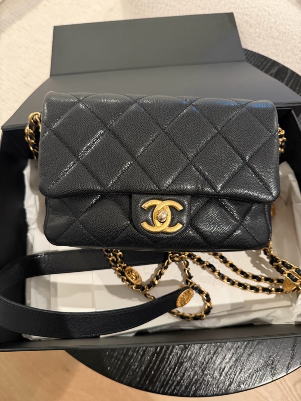 CHANEL Black Quilted Mini Flap Crossbody with Gold Hardware